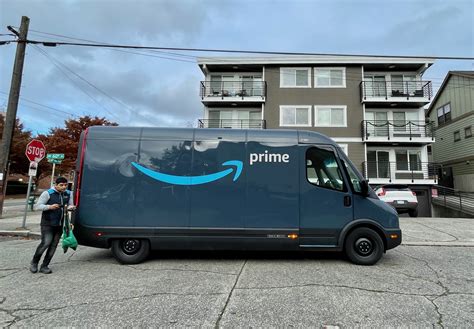 ‘It’s like driving a spaceship’: Amazon’s Rivian electric delivery vans ...