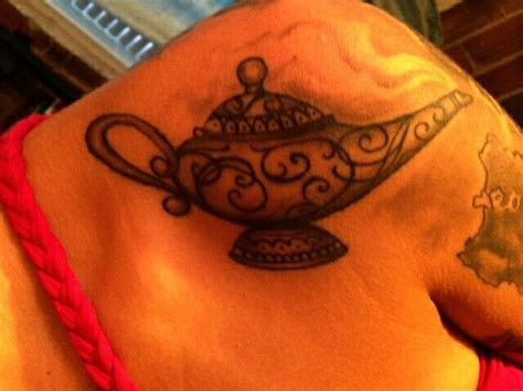 Aladdin Genie Lamp Tattoo Genie lamp tattoo. | Genie lamp tattoo, Tattoos