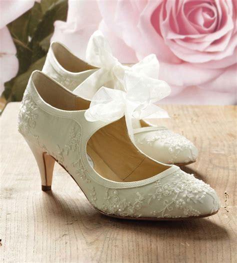 Beautiful Ivory Low Heel Bridal Shoes Mixed With Artistic Floral ...