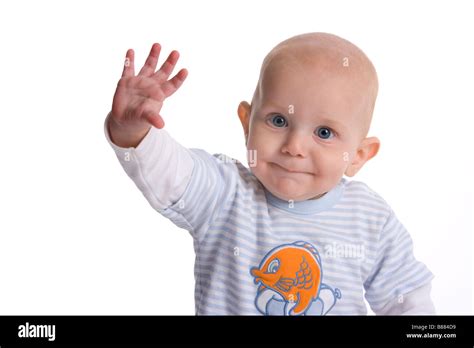 Portrait of a waving baby boy Stock Photo - Alamy