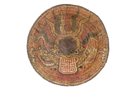 An antique Vietnamese rattan shield. Diameter: 65 cm / 25.6 inch Dome ...