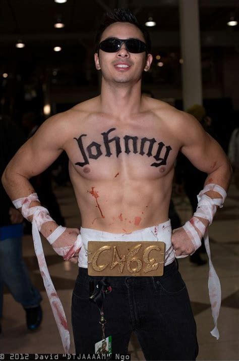 a man with his shirt off and the word johnny written on his chest is ...