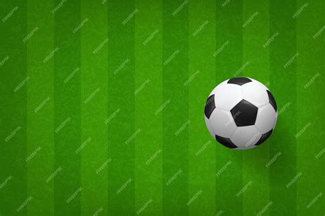 Premium Vector | Soccer football ball on green grass field pattern.