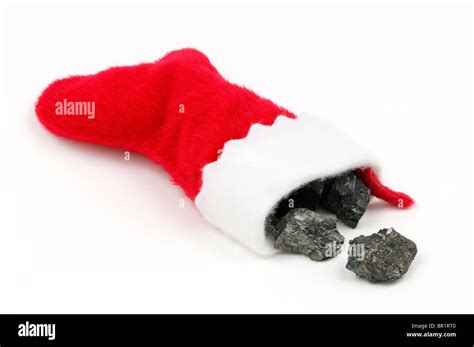 Coal in Christmas stocking Stock Photo - Alamy