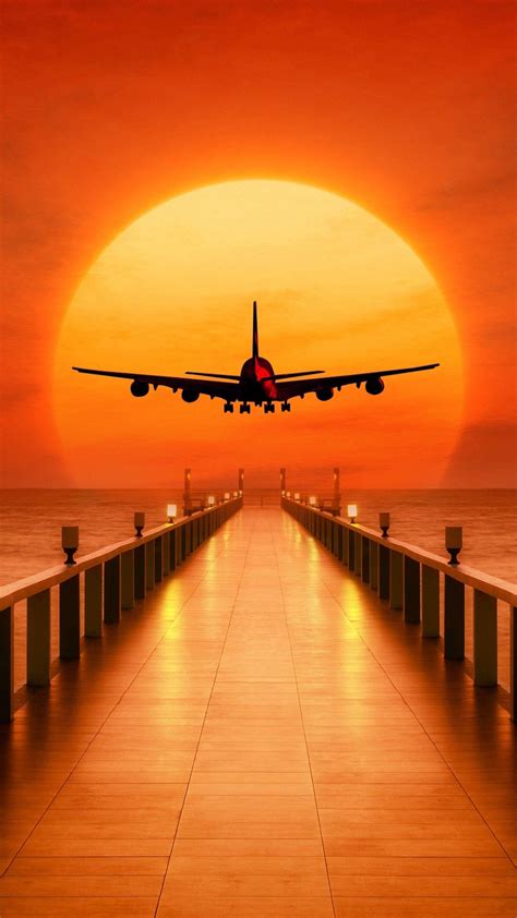 Download Orange Sunset With Airplane Android Wallpaper | Wallpapers.com