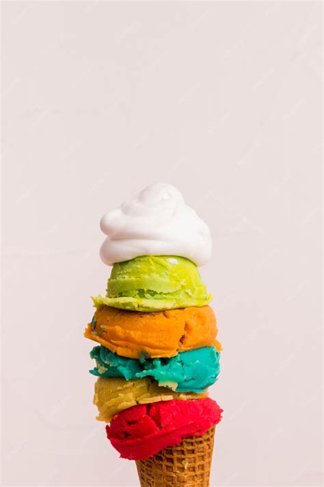 Premium Photo | Cone with scoops of ice cream in various colors