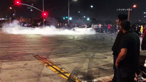 VIDEO: Wild car stunt sideshow draws large crowd in Compton - ABC7 Los ...