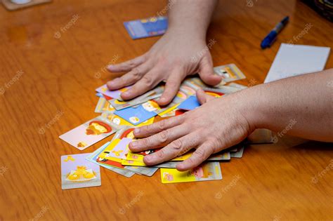 Premium Photo | Friends playing board games card game