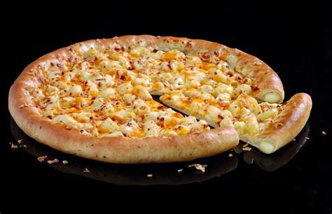 Pizza Hut just launched Mac 'N' Cheese Stuffed Crust pizza – and it's ...