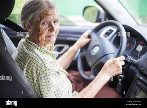 enior woman driving a car Stock Photo - Alamy