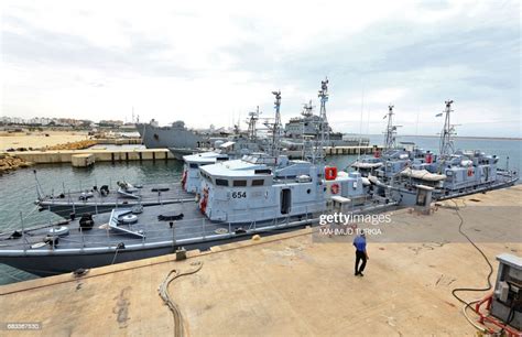 A general view shows four Libyan Coast Guard ships docked in the ...