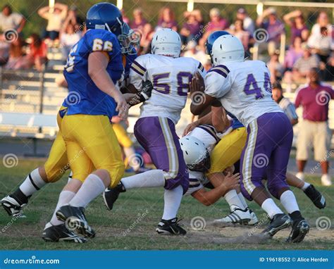 High School Spring Football Editorial Photography - Image of students ...