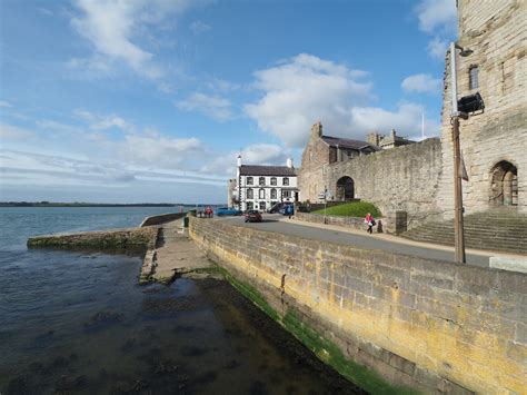 Caernarfon Castle and village in Wales | To Europe and Beyond