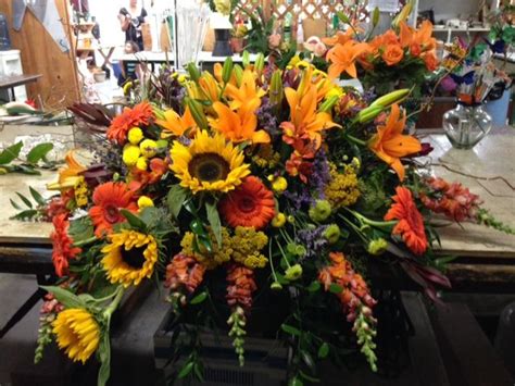 Half casket spray of fall colors ~ Padaro Floral Casket Flowers, Grave ...