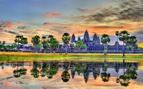 Sunrise at Angkor Wat, a UNESCO world heritage site in - Savile Row Travel