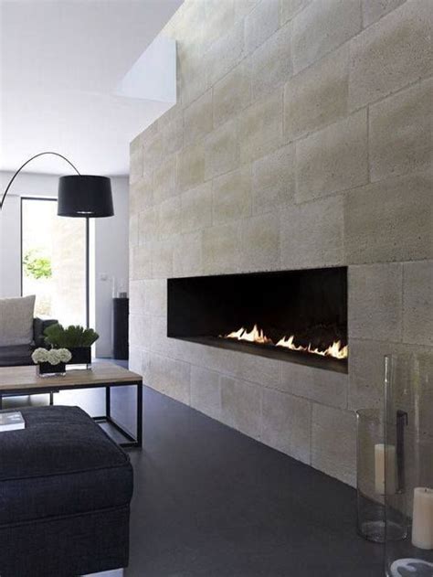 Limestone feature wall with grey tiles | Contemporary fireplace, Home ...