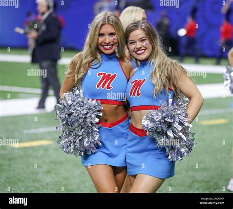 January 1, 2022: Two Ole Miss cheerleaders pose for a picture during ...