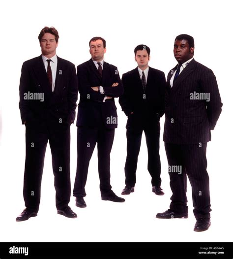 4 serious men in suits Stock Photo - Alamy