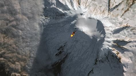 Heard Island: Rare image shows sub-Antarctic Aussie volcano erupting ...