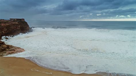 Lighthouse On Cliff With Fortress In Nazare Stock Footage SBV-347394028 ...