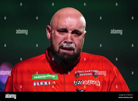 Jamie Hughes reacts after winning his match against David Cameron (not ...