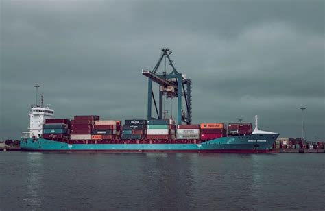 Premium Photo | Container ship docking in the port