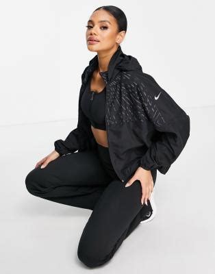 Nike Running Run Division reflective jacket in black | ASOS