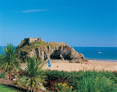 Tenby Castle beach on the Pembrokeshire Coast, West Wales. For ...