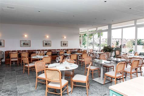 Tables and Chairs in Cafeteria · Free Stock Photo