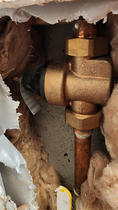 New watts pressure reducing valve leaking from screw : r/Plumbing