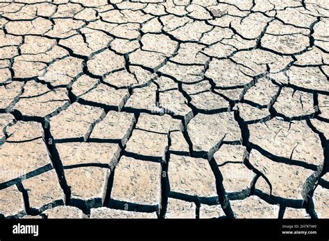 Dry cracked earth drought dry earth dry soil arid clay soil with cracks ...