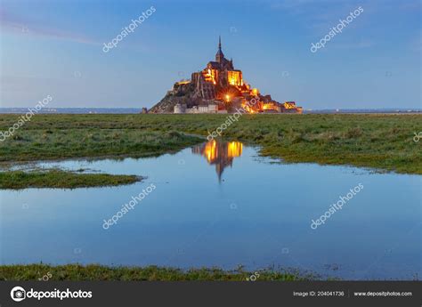 Mont Saint-Michel at sunset. Stock Photo by ©pillerss 204041736