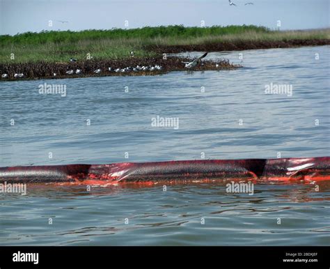 Oil Spill Containment Boom Stock Photo - Alamy