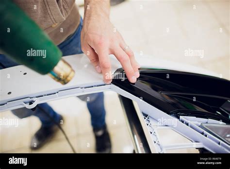 Car paint protection, protect coating installation Stock Photo - Alamy