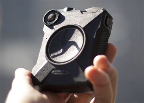 Taser rebrands as Axon and offers free body cameras to any police ...