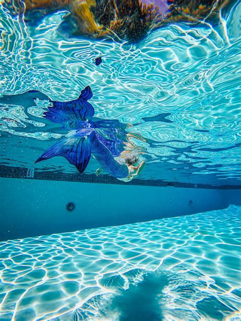 A Mermaid Swimming on a Swimming Pool · Free Stock Photo