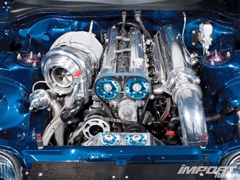 the engine compartment of a blue sports car