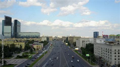 Aerial view of highway in the city. City road with cityscape and ...