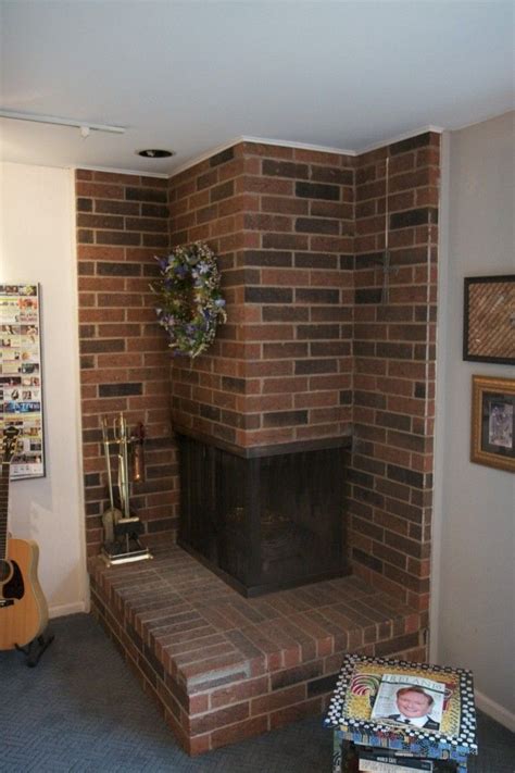 brick corner fireplace | Fireplace remodel, Freestanding fireplace ...