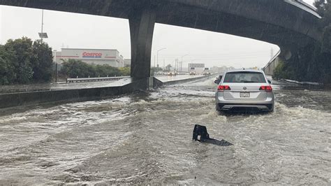 Storm brings flooding, landslides across California : NPR