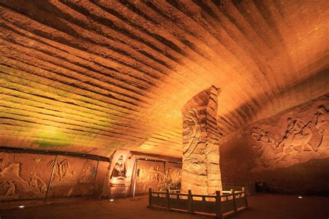 The Longyou Caves are a series of large artificial sandstone caverns ...