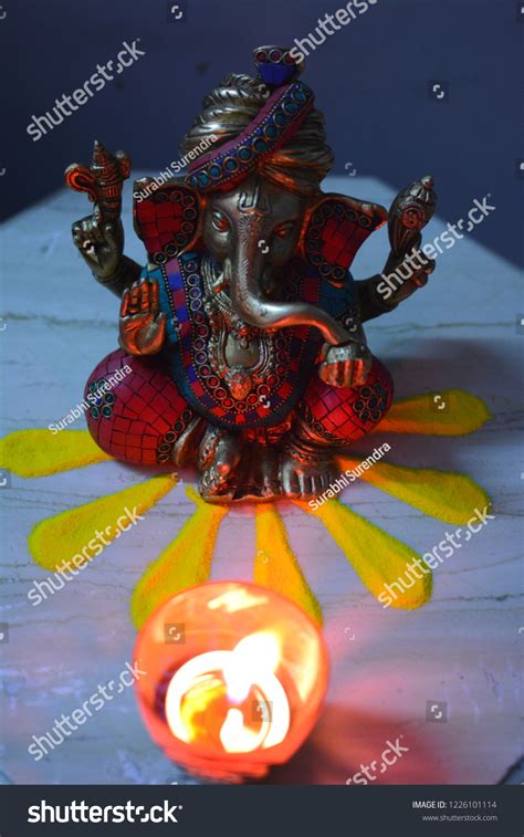 Lord Ganesha Idol Sitting On Rangoli Stock Photo 1226101114 | Shutterstock