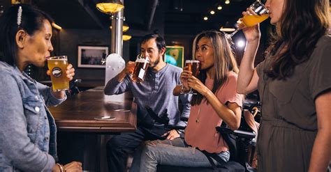 People Drinking Beverages Inside Bar · Free Stock Photo