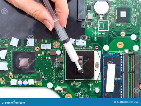 Replacing Thermal Paste on a Laptop. Stock Image - Image of paste ...