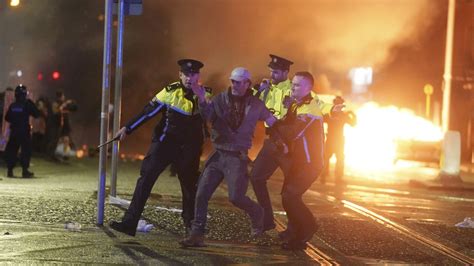 Protesters take to streets in Dublin after knife attack injures three ...