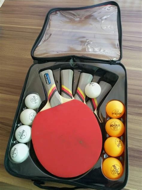 4 Joola table tennis bats and 9 ping pong balls with carry case - used ...