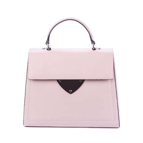 Premium Photo | Modern light pink leather women's handbag with a top ...