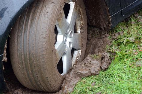 Cars stuck in mud at car park after Festival No 6 - North Wales Live