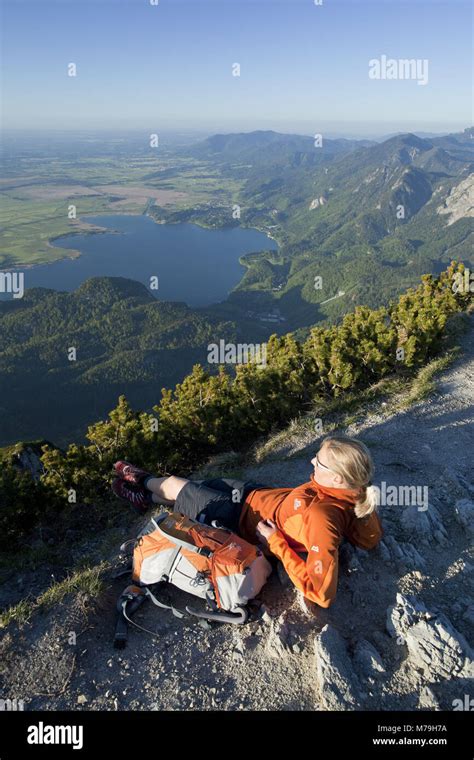 Hiking scene in the 'Herzogstand', Bavarian alps, Germany Stock Photo ...