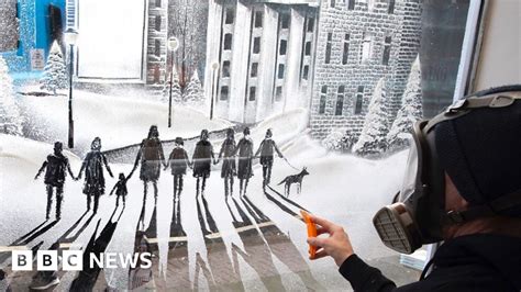 Watch: Christmas snow-window art helping Crisis charity